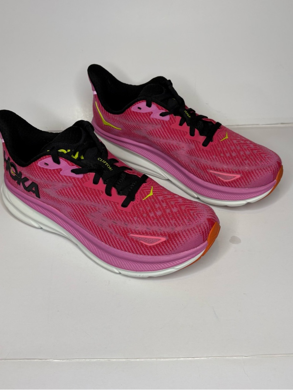 Hoka Pink and Black Women's Running Shoes with Orange Accents
